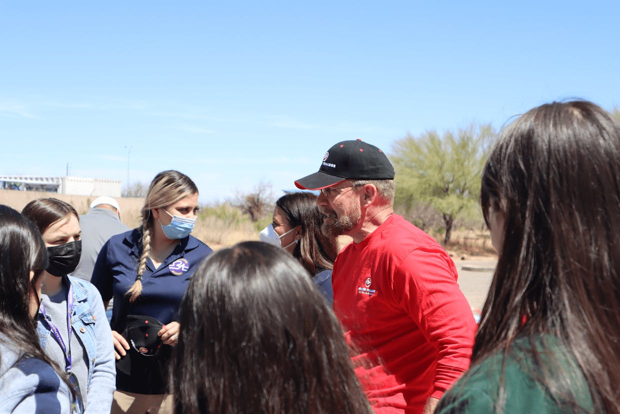 Karl Griffor, Assistant Dean of Workforce Development at Cochise College, greets a cohort of high school students during the college's Skilled Trades Day event on March 31 at the Sierra Vista campus. Griffor was the main organizer of the event. 