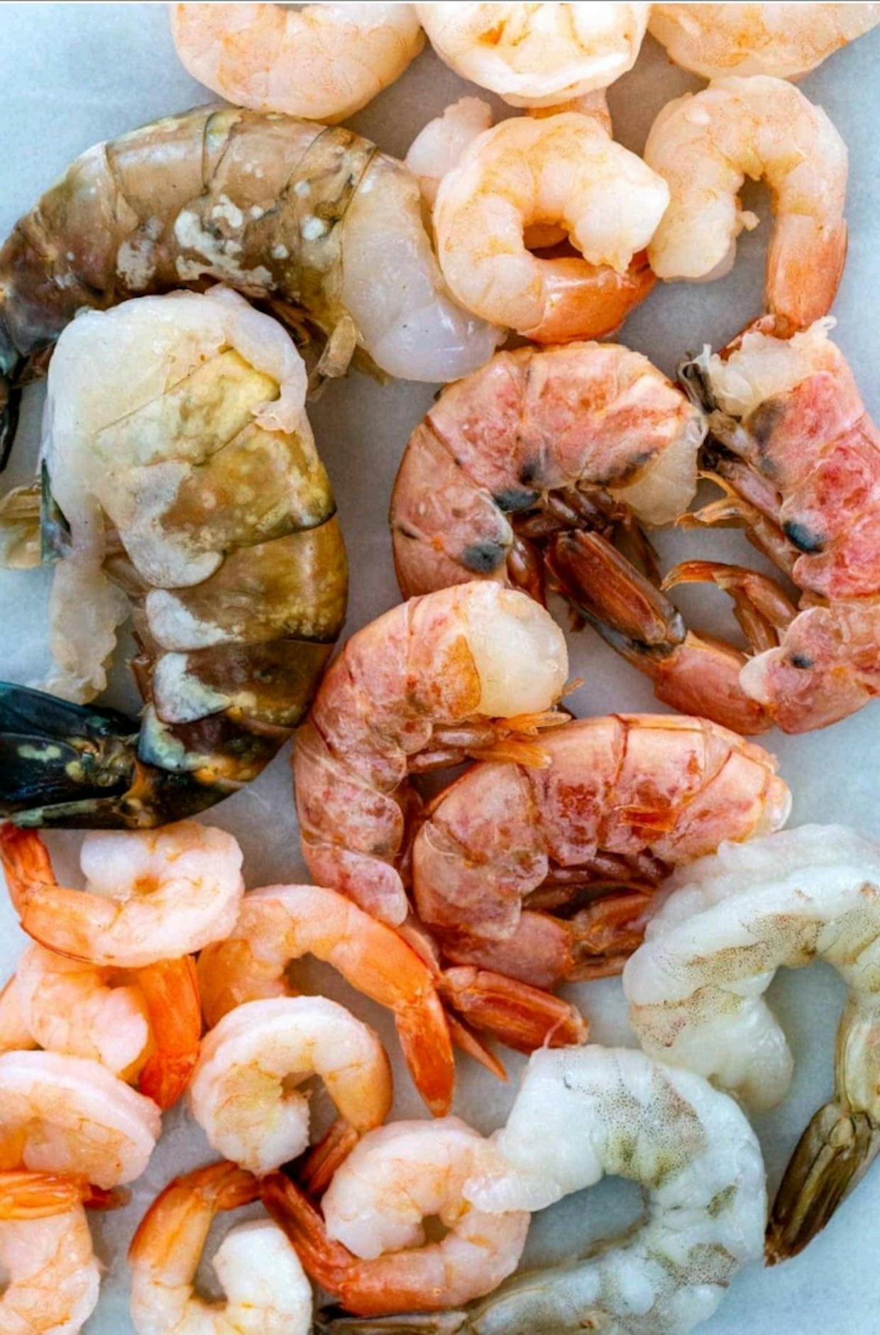 White shrimp: These are on the sweeter side, but tend to taste nuttier than pink shrimp. There are also Chinese white shrimp and Mexican white shrimp which are farmed species and not wild caught (usually less sustainable).Pink shrimp: These are the little pink guys you’ll typically see behind the seafood counter. They’re pink when raw, hence the name.Rock shrimp: While they start out in hard shells, they’re typically deshelled before they’re sold. They’re often compared to lobster because of their firm texture, and you can substitute them for lobster as a more affordable protein.Brown shrimp: They have a more mineral flavor than white and pink shrimp, and they can contain more iodine. They turn pink once they’re cooked and are commonly used in dishes like gumbo.Royal red shrimp: Named after their bright red color, they’re also often compared to lobster because of their rich flavor and firm texture.Tiger shrimp: These little fellas are characterized by their stripes and can actually become quite large, but they tend to be farmed and not very sustainable.