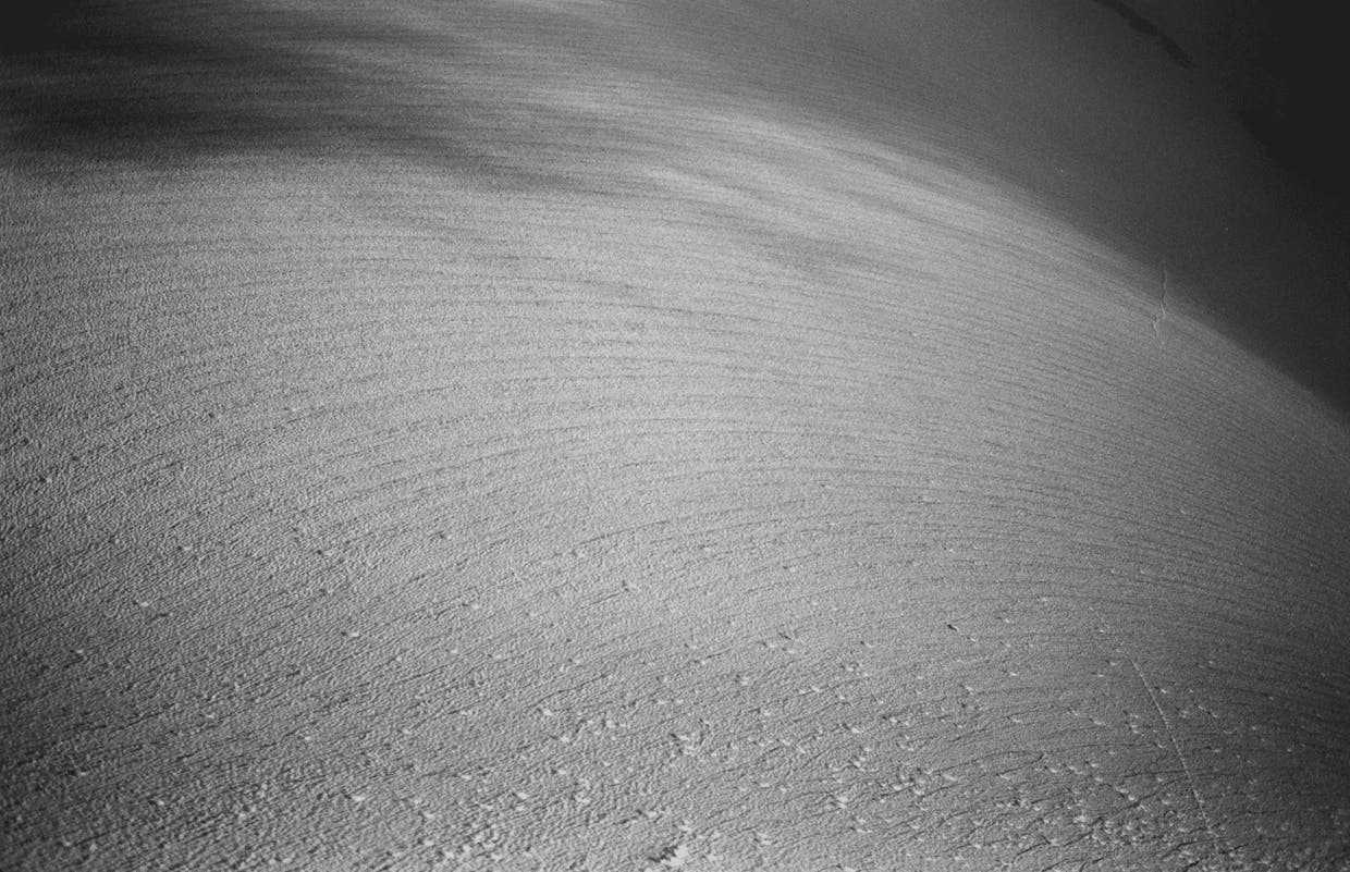 A snowfield sits frozen on the North side of Mt. Daniel near its east peak summit, July 21.