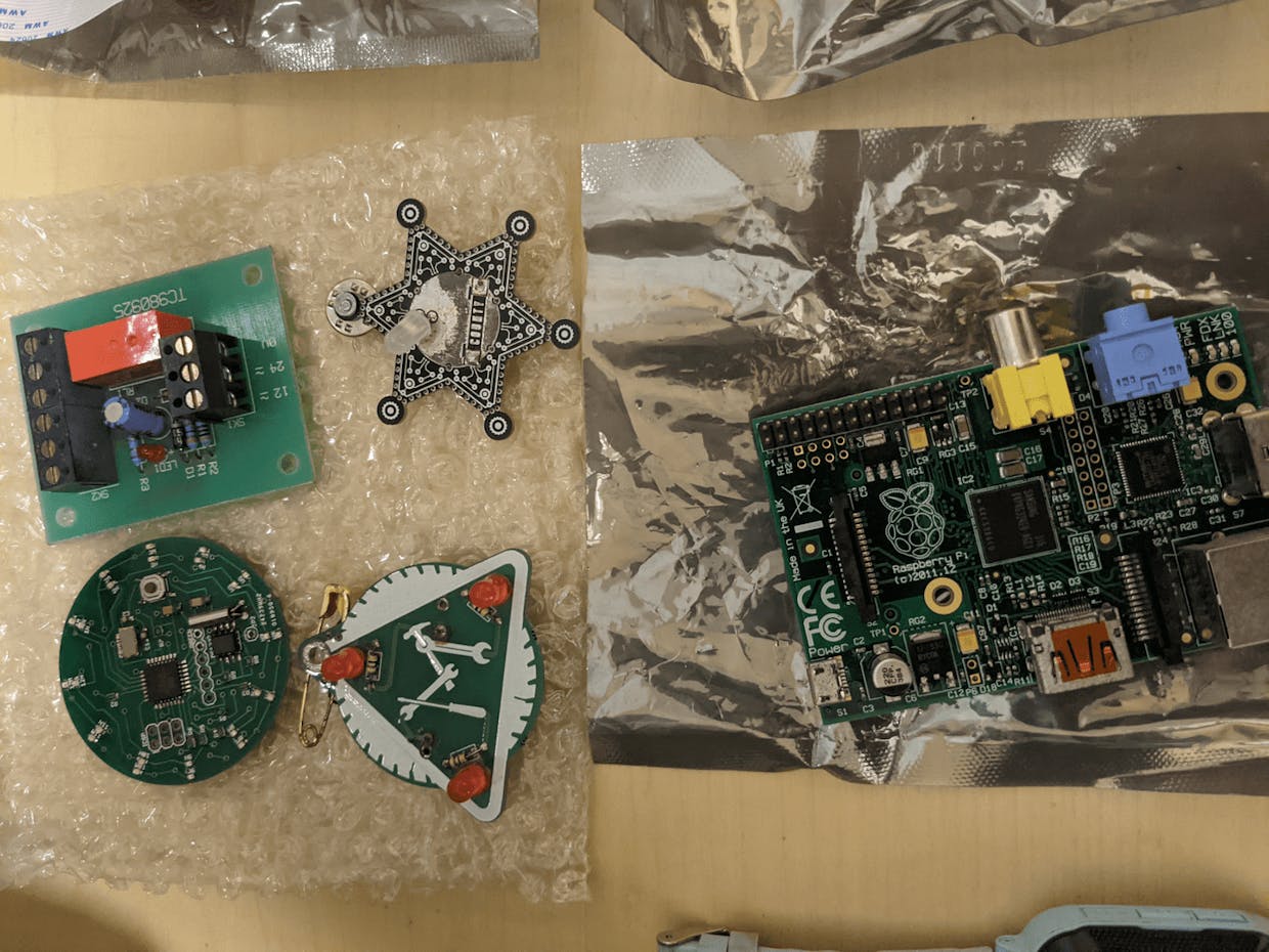 Some wearable electronics, a gen 1 RPi board and what looks like a relay board