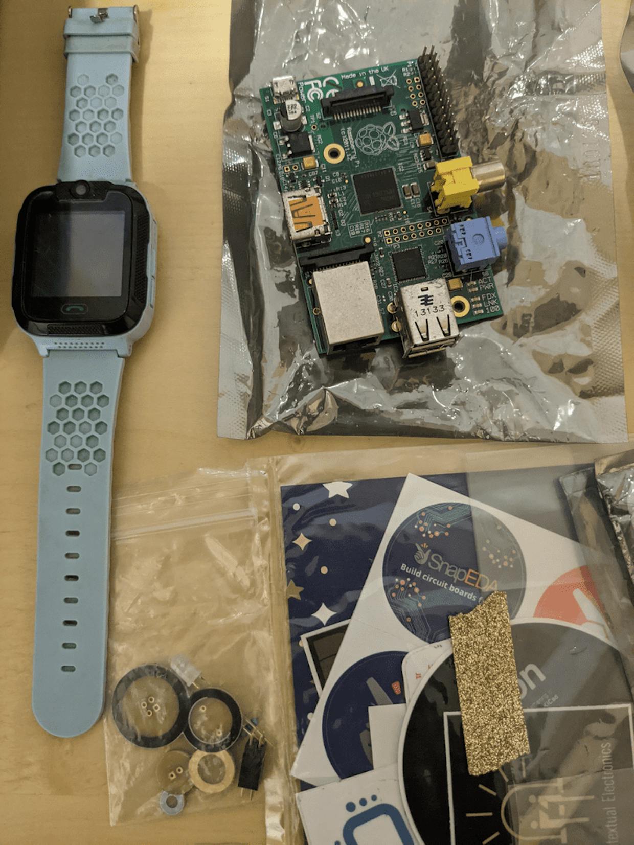 Stickers, Wearable buttons and what appears to be a Moochies watch
