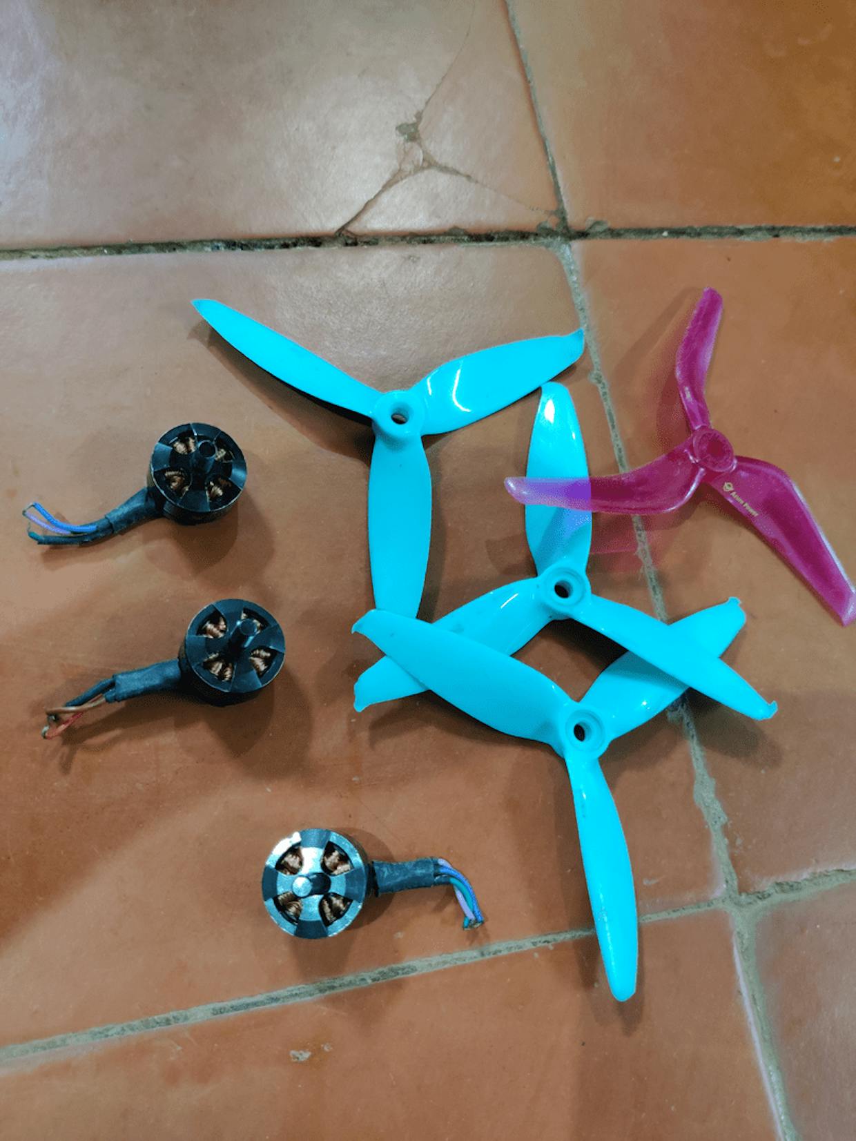 Four Propellers and three BLDC motors - enough to make a tri-copter using the Seriously Dodo flight controller