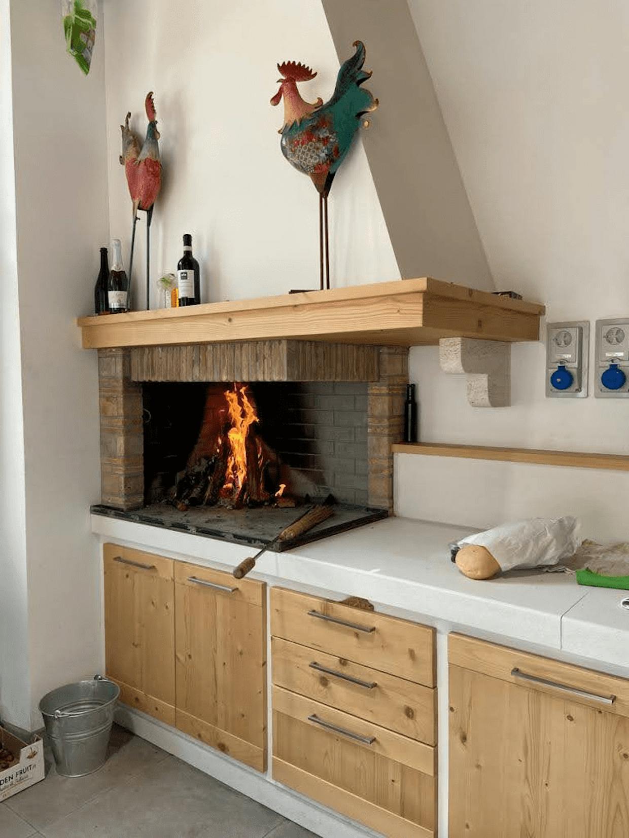 The countertop fireplace in the tasting room at Frantoio dell'Eremo