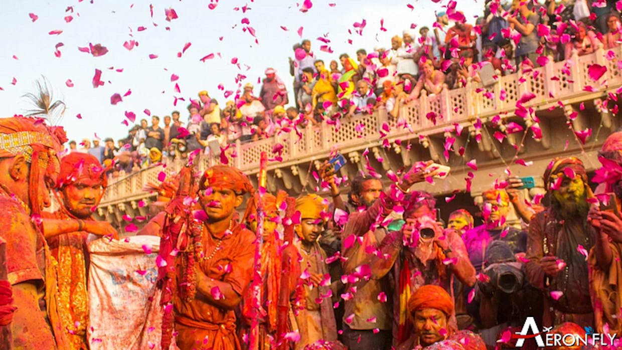 What is the significance of the colors used during Holi festival, and how do they symbolize different aspects of Indian culture and mythology?