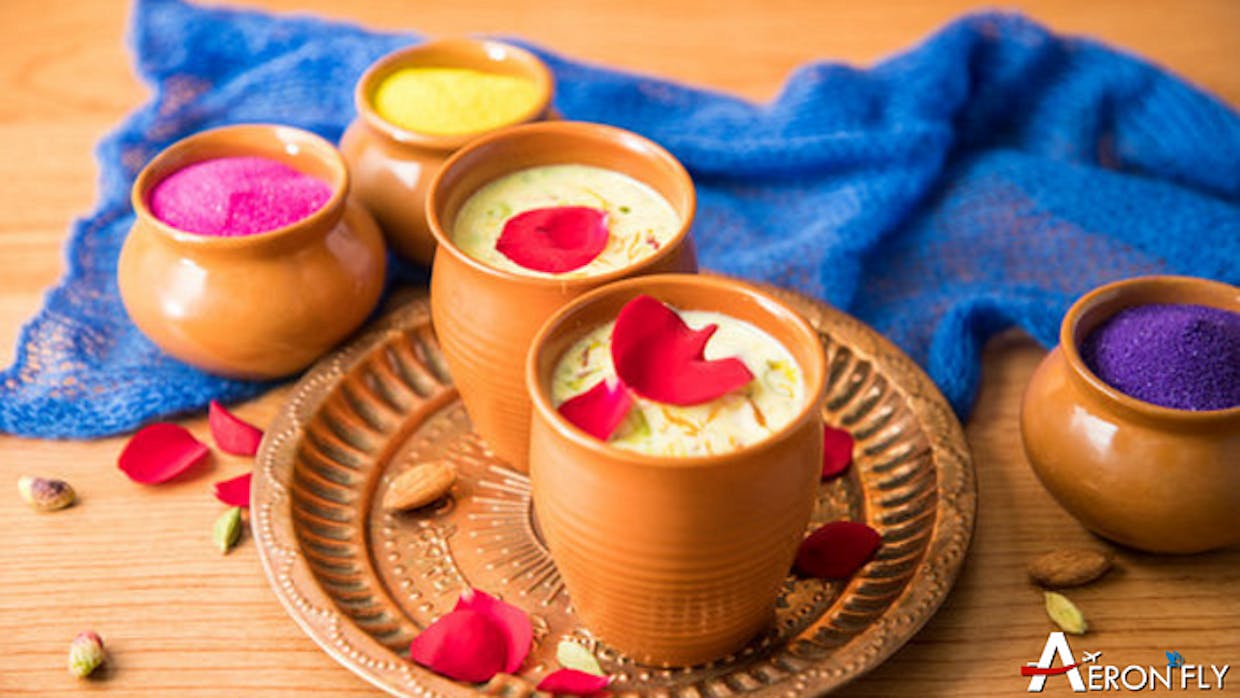How do different regions of India celebrate Holi, and what are some unique traditions associated with the festival in each region?