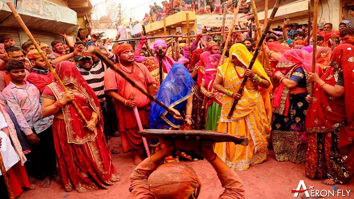 What is the significance of the colors used during Holi festival, and how do they symbolize different aspects of Indian culture and mythology?