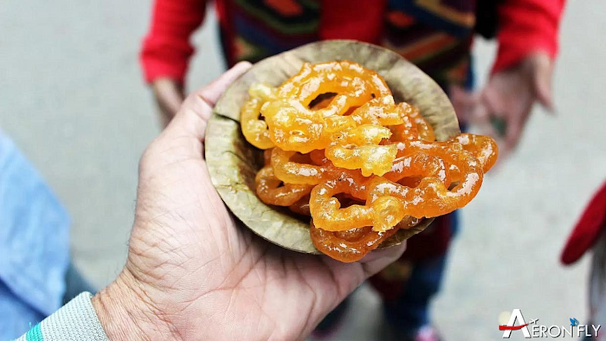 Which sweet is famous in Varanasi?