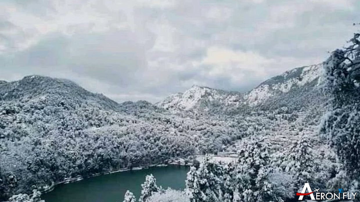 What are the top tourist attractions in Nainital and how can visitors make the most of their trip to this scenic hill station in India.