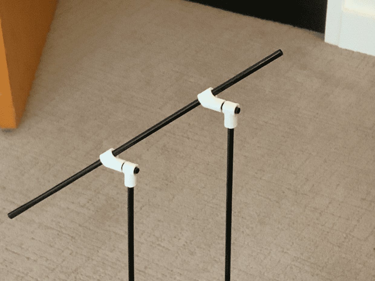 I need to make a handrail for a ramp.  I do not see an adjustable "T" that will allow me to build the handrail parallel to the ramp decline.  Any ideas?  Thanks.